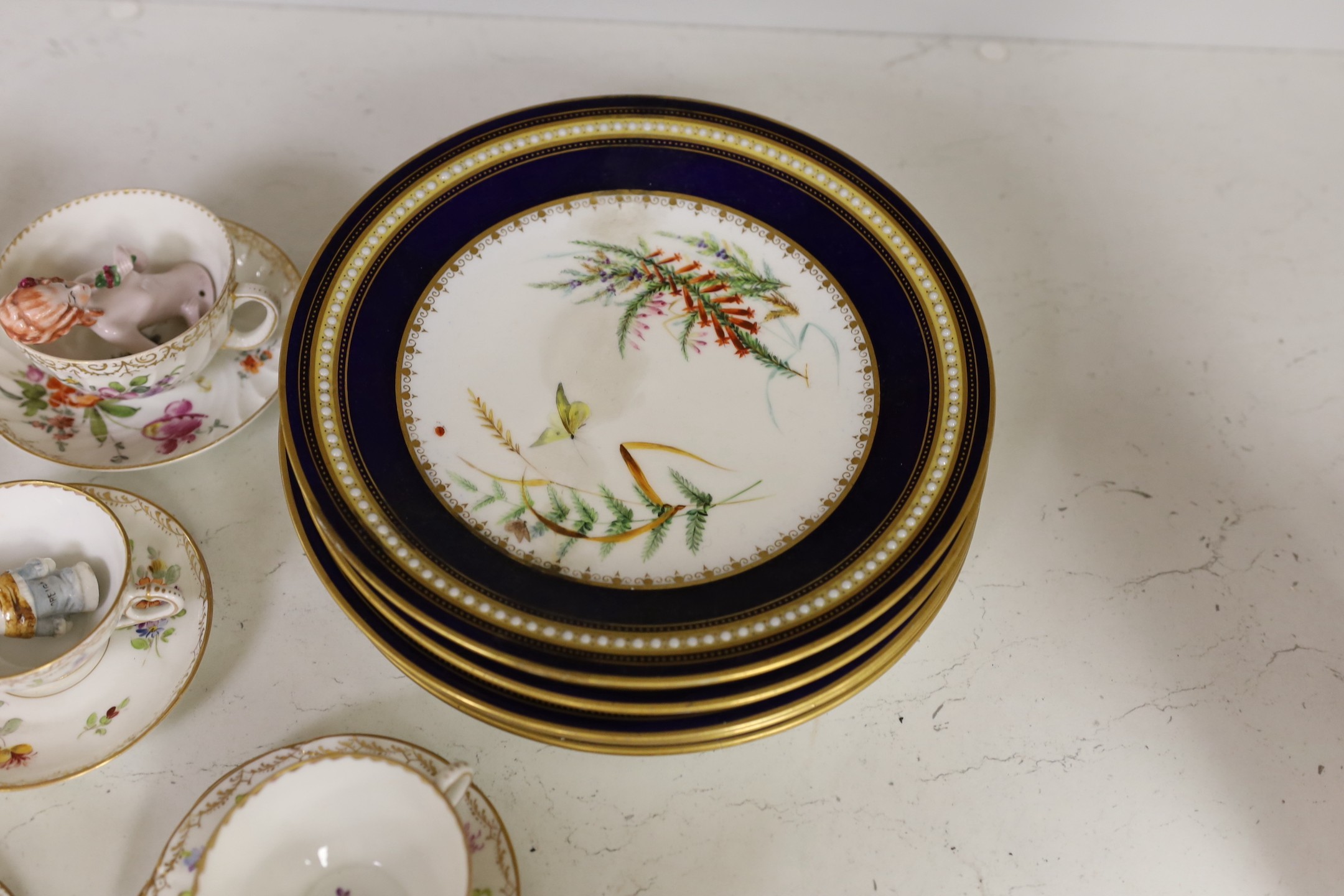 A group of Dresden floral cups and saucers, and five jewelled cabinet plates, etc.